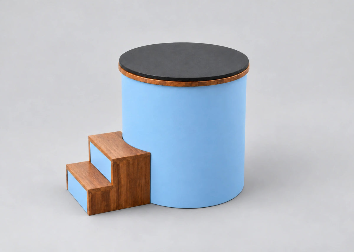 Temperd Barrel Pro cold plunge in Arctic Baby Blue, with the lid closed and the wooden entry steps