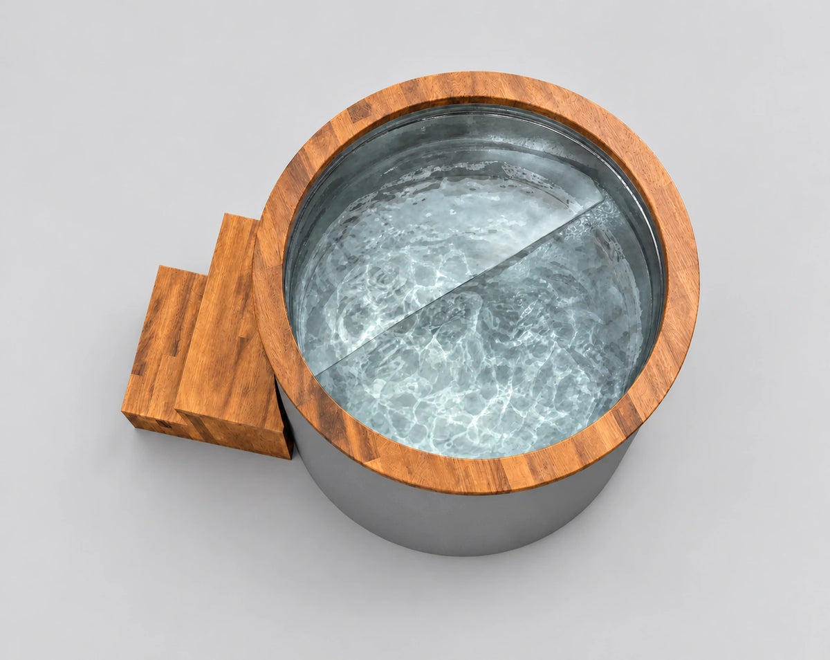 Temperd Barrel Pro cold plunge in Icelandic Gray, seen from above with the lid off, filled with water