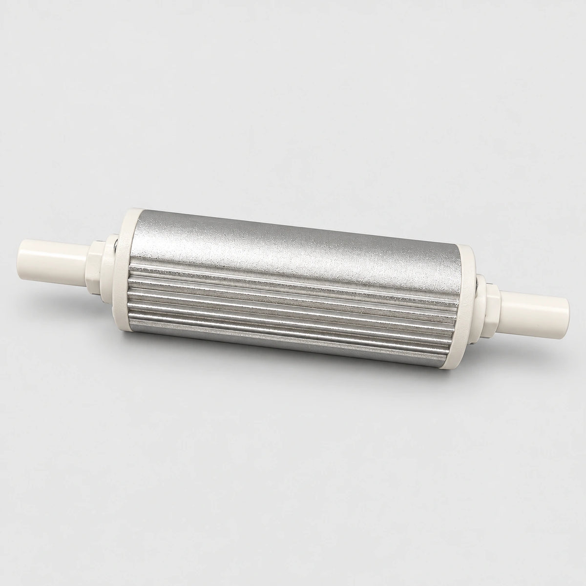 Temperd UV-C lamp module with a silver ribbed housing and white water fittings, shown without cables.